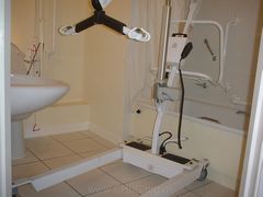 Perils of a mobile hoist -No room in the bathroom to open up the legs of the hoist and provide stability.