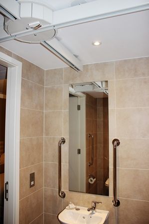 Dorsett Hotel, ceiling hoist track from turntable to wash basin