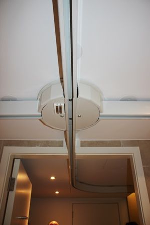 Dorsett Hotel, ceiling track hoist in bathroom.